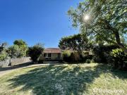 Spacious 4 Bedroom Home with Huge Backyard and Workshop!