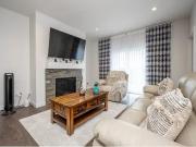 Spacious 4 Bedroom Main Floor Home Backing onto Green...