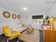 Spacious air conditioned two bedroom unit close to the beach