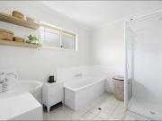 SPACIOUS AND BEAUTIFULLY PRESENTED TOWNHOME