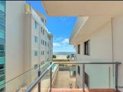 SPACIOUS BEACHFRONT LIVING TOP FLOOR APARTMENT