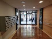 Spacious bedroom with balcony in modern apartment in...