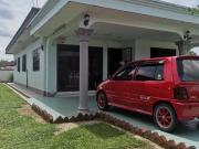 Spacious bungalow house with ample space surrounding it