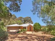 Spacious family home on huge block, close to town