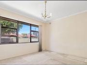 Spacious Family Home with Large Yard in a Convenient...