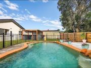 Spacious Family Home with Pool – Backing onto Parkland!