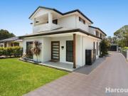 Spacious family living with pool, huge tradie's shed...