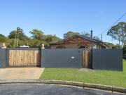 Spacious Family Retreat with Versatile Living in a...