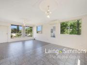 Spacious, Low Maintenance Living in a Prime Location!