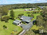 Spacious Modern Comfort & Acreage Appeal in Sought After...