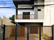 SPACIOUS MODERN SINGLE ATTACHED HOUSE AND LOT IN PILAR...