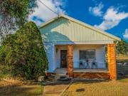 Spacious Retreat with Ample Storage: Charming 3 Bedroom...