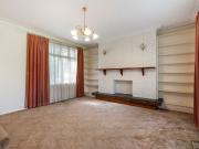 Spacious Split Level Brick Home with Elevated Features