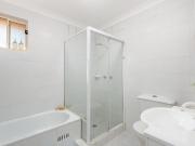 Spacious top floor apartment in vibrant village locale