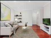 Spacious top floor apartment offers convenience and low...