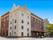 Spacious Woolstore Apartment with Balcony & Pool Views