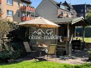 Stadtwohnung mit Garten, Garage und Wellnessbereich