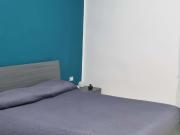 Stanza con bagno condiviso