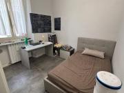 Stanza in appartamento in affitto a Torino