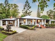 STATEMENT HOME WITH POOL, COTTAGE AND STUDIO IS ONE OF...