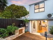 Statement in immaculate living alongside Alexandria Park