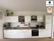 Stilvolle Anlegerwohnung mit Eigengarten und Terrasse in... Stilvolle Anlegerwohnung mit Eigengarten und Terrasse in...