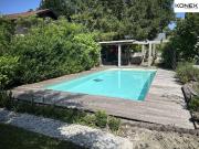 Stilvolles Einfamilienhaus mit Pool & Teich in begehrter... Stilvolles Einfamilienhaus mit Pool & Teich in begehrter...