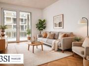 Stilvolles Wohnen mit Balkon über den Dächern der Stadt