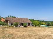Stone property with pool on the edge of a village