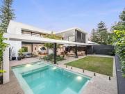 Striking Architectural Masterpiece Offering Luxury...