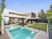 Striking Architectural Masterpiece Offering Luxury...