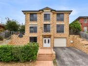 Striking Multi Level Family Home with Exceptional Space...