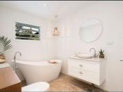 Stunning coastal upper duplex in tropical surrounds