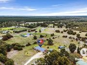 Stunning Farmhouse Retreat on 4.99 Acres back onto...