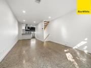 Stunning industrial inspired tri level townhouse