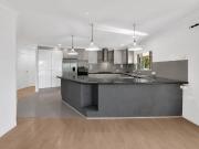 Stunning Renovated Top Floor Home with Scenic Views & Pool