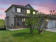 Stunning Walkout Home Backing Onto Pond – Rocky Ridge NW