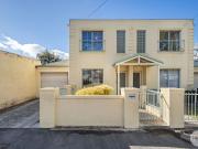 Stylish 3 Bedroom Townhouse in a Prime Central Location!