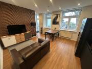 Stylish and quiet ground floor apartment in a quiet backyard