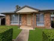 Stylish Brick Unit with Private Courtyard & Garage