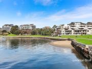 Stylish Courtyard Apartment in Resort Style Waterfront...