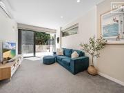 Stylish Garden Apartment in Prime Coastal Setting