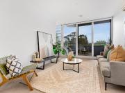 Stylish Lakefront Living with Sweeping Albert Park Views