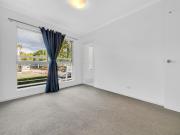 Stylish, low maintenance apartment with pool in a secure...