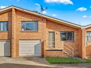 Stylish Split Level Unit in Prime Location!