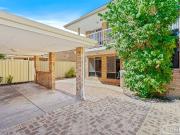 STYLISH TOWNHOUSE LIVING STEPS FROM THE FORESHORE