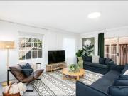 Stylish townhouse, spacious layout, walk to shops and...