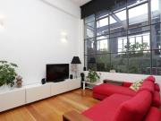 Stylish Warehouse Conversion with Expansive Private Deck!