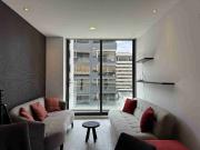 Suite amoblada con balcón, edificio con piscina....