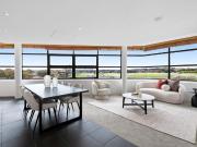 SUN DRENCHED NORTH EAST FACING APARTMENT OVERLOOKING...